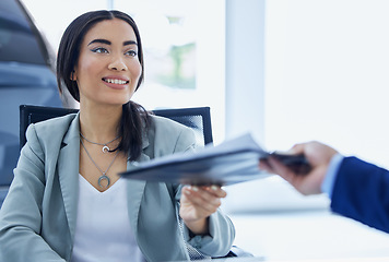 Image showing Business woman, employee and giving a file in an office with a contract, paperwork or report. Smile of a female entrepreneur or manager with a client man and document for agreement or finance budget