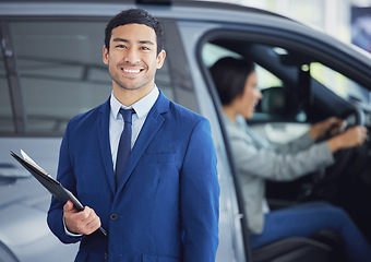 Image showing Documents, portrait and car salesman smile at showroom, workshop or workplace. Face, clipboard and Asian person at dealership for motor vehicle shopping, business and sales manager in retail store.