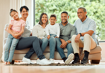 Image showing Family in portrait, grandparents and parents with kids relax on sofa with smile, generations and bonding at home. Support, trust and love with care, people are happy together in living room