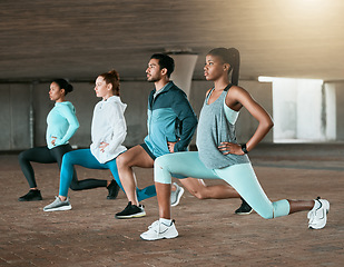 Image showing Team, training and people stretching as a fitness club for sports, health and wellness in an urban class together. Sport, commitment and friends exercise or team doing pilates workout in yoga
