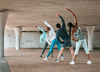 Image showing Group, workout and team stretching as a fitness club for sports, health and wellness in a class together. Sport, commitment and friends training or people doing pilates exercise or yoga as teamwork