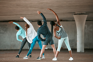 Image showing Team, yoga and people stretching as a wellness club for sports, health and fitness body in an urban class together. Sport, commitment and friends training or group doing pilates exercise or workout