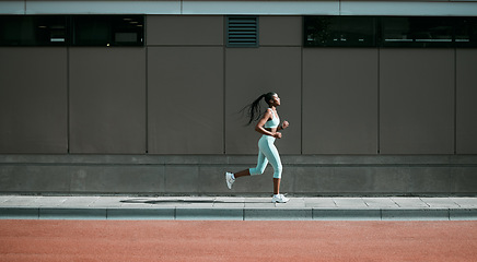 Image showing Black woman, running and city sport on sidewalk with training, exercise and fitness on road. Street, urban runner and female athlete with mockup and body workout for health, wellness and race outdoor