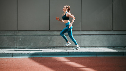 Image showing Young woman, sport running and city sidewalk with training, exercise and fitness on urban road. Street, runner profile and female athlete with mockup and workout for health, wellness and race outdoor