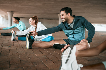 Image showing Group, workout and people stretching as a fitness club for sports, health and wellness in an urban town together. Sport, smile and happy friends training or team doing warm up exercise in a city