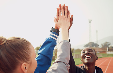 Image showing People, diversity and high five in fitness for teamwork, unity or trust together on stadium track. Happy athlete group touching hands in team building for sports motivation, support or goals outdoors