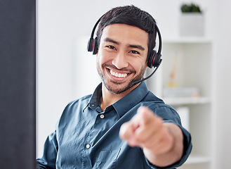 Image showing Call center, pointing and portrait of man in office for consulting, communication and customer service. Motivation, support and contact us with male employee for advice, sales or telemarketing choice