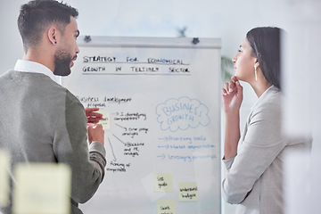 Image showing Thinking, whiteboard and people planning for business growth, brainstorming or strategy in teamwork or collaboration. Talking, presentation and professional woman, man and office solution from behind