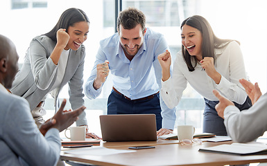 Image showing Success, businesspeople with celebration and in office of their workplace with a lens flare. Achievement or good news, happiness and colleagues happy celebrating or cheering at their workstation