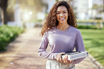 Image showing Portrait, woman with books and student in campus garden, university and education with learning material for studying. Female person outdoor, academic scholarship and mockup space and college course