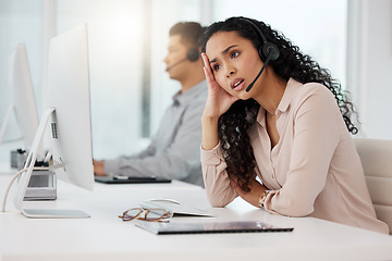 Image showing Business woman, call center and frustrated in customer service, stress or burnout at office. Annoyed and tired female person, consultant or agent talking to difficult client or complaint at workplace