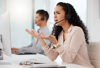 Image showing Frustrated woman, call center and consulting on computer in customer service, support or telemarketing at the office. Upset female person or consultant agent talking to difficult client at workplace