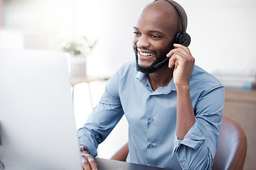 Image showing Black man, happy and agent working in call center on computer in the office, business in telemarketing or customer service. Businessman, face with smile and crm, conversation with client on help desk