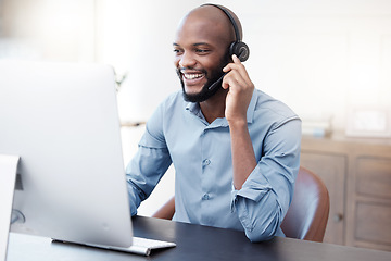 Image showing Black man, callcenter with phone call and computer, contact us with communication, headset and technology. Male consultant, CRM with customer service and tech support with help desk worker and smile