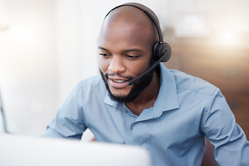 Image showing Black man, call center worker and CRM with contact us, communication and computer, headset with mic and connect. Male consultant, customer service and tech support with help desk employee in office