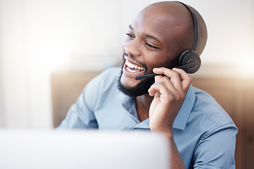 Image showing Agent, call center and happy black man working on computer in the office, business in telemarketing or customer service. Businessman, face with smile and crm, conversation with client on help desk