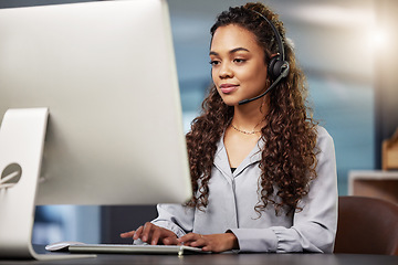 Image showing Call center, virtual assistant or woman typing on computer at telecom customer services office job help desk. Microphone, technology or female sales agent consulting or helping in tech support on pc