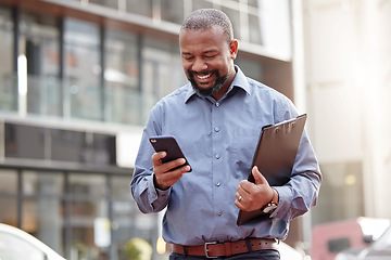 Image showing Businessman, phone and typing an email at office, building and corporate workplace communication. Happy, senior and black man on mobile, smartphone or technology for online search, text or contact