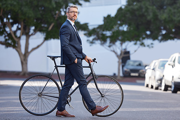 Image showing Bike, morning and business man in city for carbon neutral, commute and environment. Professional, executive and sustainability with employee and bicycle in outdoors for cycling, natural and health