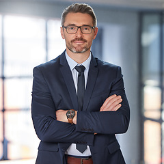 Image showing Portrait, business and man with arms crossed, career and startup success with confidence, ceo and employee. Face, mature male person or happy entrepreneur in a suit, professional and boss with skills