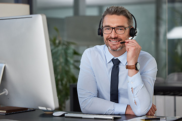 Image showing Businessman, call center and portrait smile with headphones in telemarketing, customer service or support at office. Happy man, consultant or agent smiling for online advice or telesales at workplace