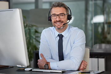 Image showing Businessman, call center and portrait smile in customer service, support or telemarketing at office. Happy man, consultant or agent smiling with headphones for online advice or telesales at workplace