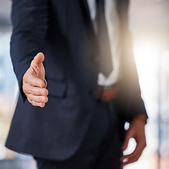 Image showing Businessman, handshake and deal in meeting for hiring, partnership or b2b agreement at the office. Man employee shaking hands for business welcome, recruiting or introduction to job at the workplace