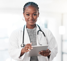 Image showing Portrait, tablet and healthcare with a doctor black woman in the hospital for insurance or research. Medical, trust and technology with a young female medicine professional or consultant in a clinic