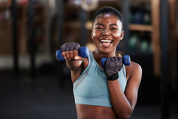 Image showing Portrait of boxer, dumbbell or happy black woman training, exercise or workout for a strong punch or power. Smile, face or African girl boxing with dumbbells, weights or exercising in fitness gym