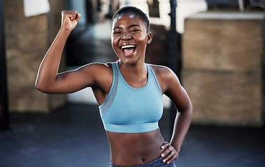 Image showing Portrait, fitness or happy black woman flexing with strong biceps muscle or body goals in training workout. Exercise, powerful arms or healthy African girl sports athlete excited by results at gym