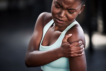 Image showing Sports, fitness and woman with shoulder injury or pain or workout accident and on mockup. Workout, train and African female athlete with a medical emergency or sprain muscle after a cardio exercise.