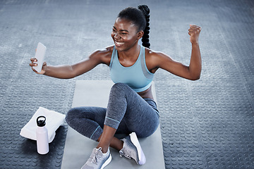 Image showing Gym, fitness or happy black woman taking selfie on workout, exercise or training break on social media. Wellness, smile or healthy African girl flexing, relaxing or taking pictures for online content