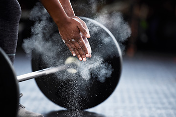 Image showing Fitness, barbell or hands of bodybuilder with chalk in workout or exercise for strength training. Deadlift, powerlifting closeup or sports athlete weightlifting with powder or dust on gym floor