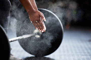 Image showing Fitness, barbell or hands of bodybuilder with powder in workout or exercise for strength training. Deadlift, powerlifting closeup or sports athlete weightlifting with chalk or dust on gym floor