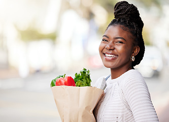 Image showing Portrait, grocery shopping and black woman with a bag, discount and happiness with healthy products, items and retail. Face, female person and shopper with sale, produce and customer with nutrition