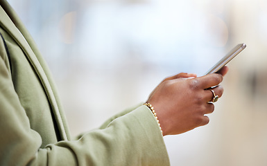 Image showing Woman, hands and phone typing for communication, social media or texting in online networking or app. Hand of female person chatting on mobile smartphone for browsing internet or research at office