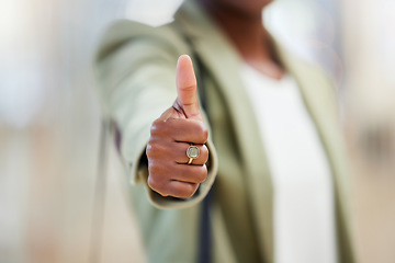 Image showing Business woman, hands and thumbs up for winning, success or good job in approval at office. Hand of female person showing thumb emoji, yes sign or like for motivation, win or promotion at workplace