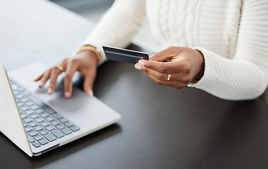 Image showing Woman, hands and laptop with credit card for online shopping, payment or finance on office desk. Hand of female person or shopper on computer for banking app, purchase or ecommerce at the workplace