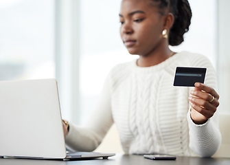 Image showing Black woman, laptop and credit card for payment, online shopping or finance on the office desk. African female person or shopper on computer for banking app, purchase or ecommerce at the workplace