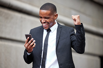 Image showing Black man, business and smartphone with celebration in street for winning, trading profit or bonus in city. African businessman, phone and winner on internet for esports, gambling or promotion at job