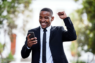 Image showing Black man, business and phone with celebration in street for winning, trading profit or bonus in city. African businessman, smartphone and winner on internet for esports, gambling or promotion at job