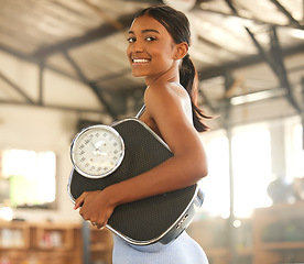 Image showing Gym, portrait or happy Indian woman with scale after body training or fitness workout to lose weight. Wellness, personal trainer or sports girl athlete in health club for exercising progress results