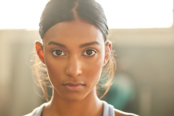 Image showing Fitness, portrait or Indian woman at gym for a workout, exercise or training for health or wellness. Face of sports girl or serious female athlete with strong mindset, resilience or focus in studio