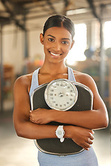Image showing Fitness, portrait or happy Indian woman with scale after body training or gym workout to lose weight. Wellness, personal trainer or sports girl athlete in health club for exercising progress results