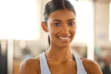 Image showing Fitness, portrait or happy Indian woman at gym for a workout, exercise or training for wellness. Face of sports girl or proud female athlete smiling or relaxing with positive mindset in health club
