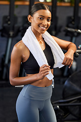 Image showing Fitness, portrait or happy Indian woman at gym for a workout, exercise or training for healthy body. Face, sports girl or proud athlete smiling or relaxing with positive mindset, smile or wellness