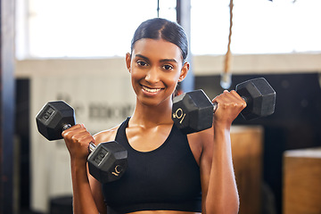 Image showing Fitness, dumbbells or portrait of happy woman training, exercise or workout for powerful arms or muscles. Dumbbell curls, strength or Indian girl athlete lifting weights or exercising biceps at gym