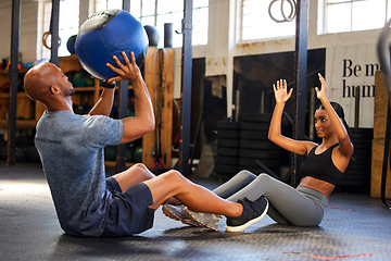 Image showing Fitness, gym and personal trainer with medicine ball and woman for training, workout or class. Client person and a man at a health and wellness club for exercise, strong muscle and catch challenge