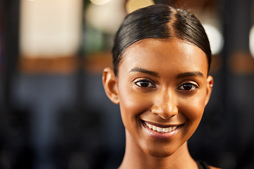 Image showing Fitness, portrait or happy woman with smile in gym to workout, exercise or training for wellness. Face of personal trainer, sports girl or confident athlete smiling or relaxing with positive mindset