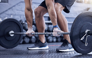 Image showing Man, training and lift weight with hands at the gym with legs for wellness with exercise. Male athlete, barbell and workout with hand at a club for strong muscles for lifting the fitness equipment.